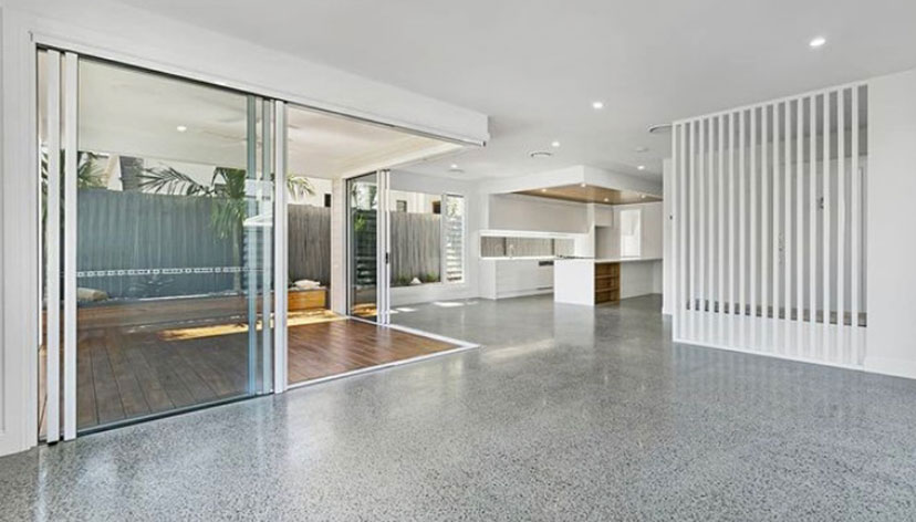 Interior of newly renovated home, featuring polished concrete floors